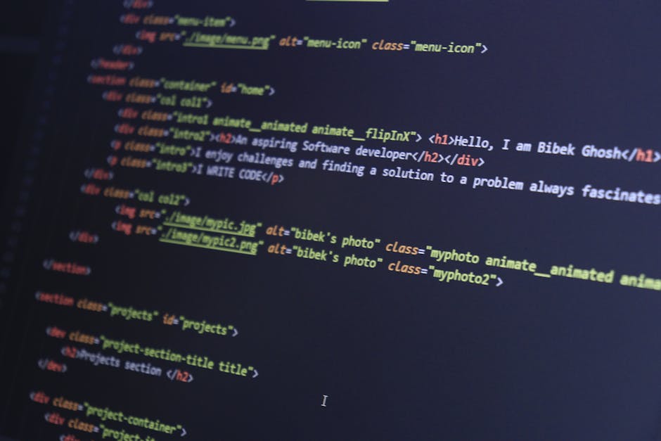 A close-up view of a computer screen displaying lines of HTML code with syntax highlighting in various colors. The code includes tags such as <h1> and <div>, and references to image files like 'bibek'